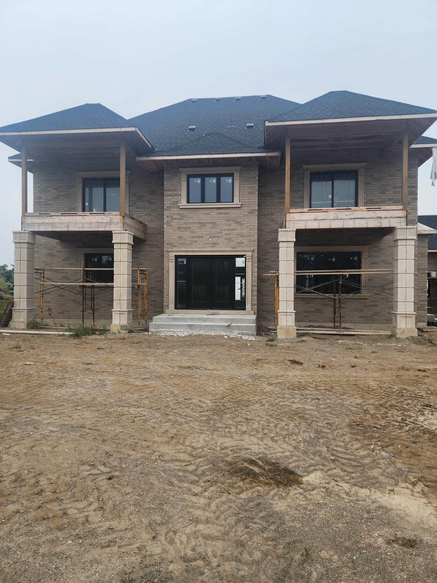 Two luxury residential buildings under coordinated construction
