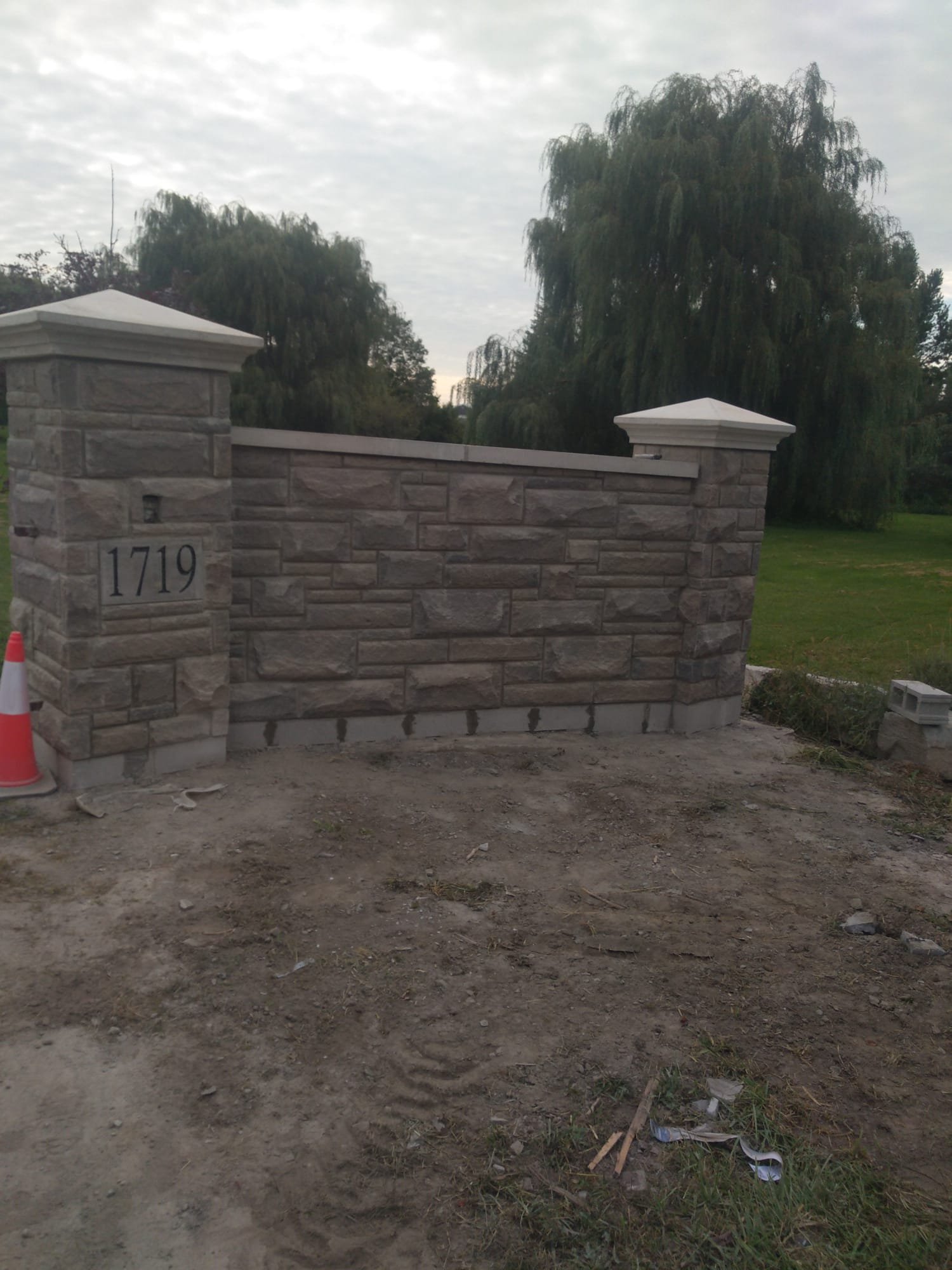 Stone entry wall and architectural detail on a residential property