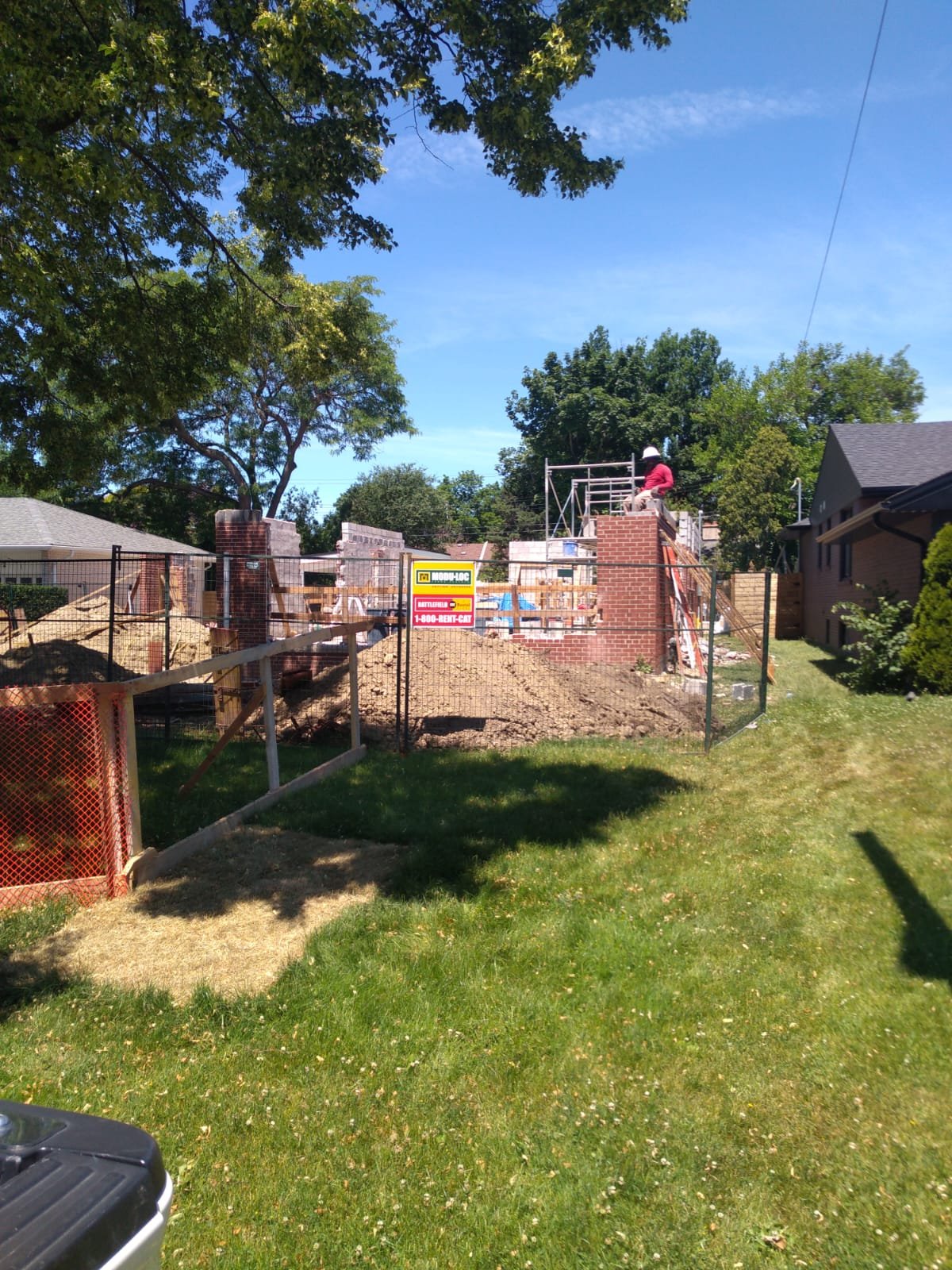 Backyard site prepared for foundation work and new construction
