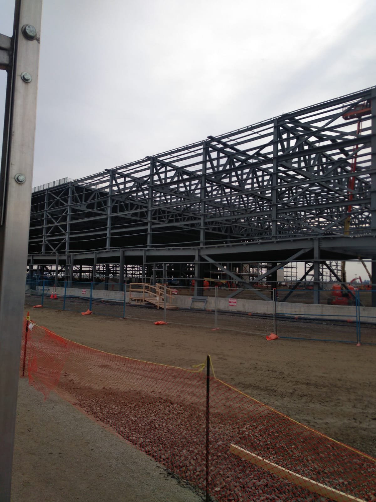 Large commercial steel-frame building under construction