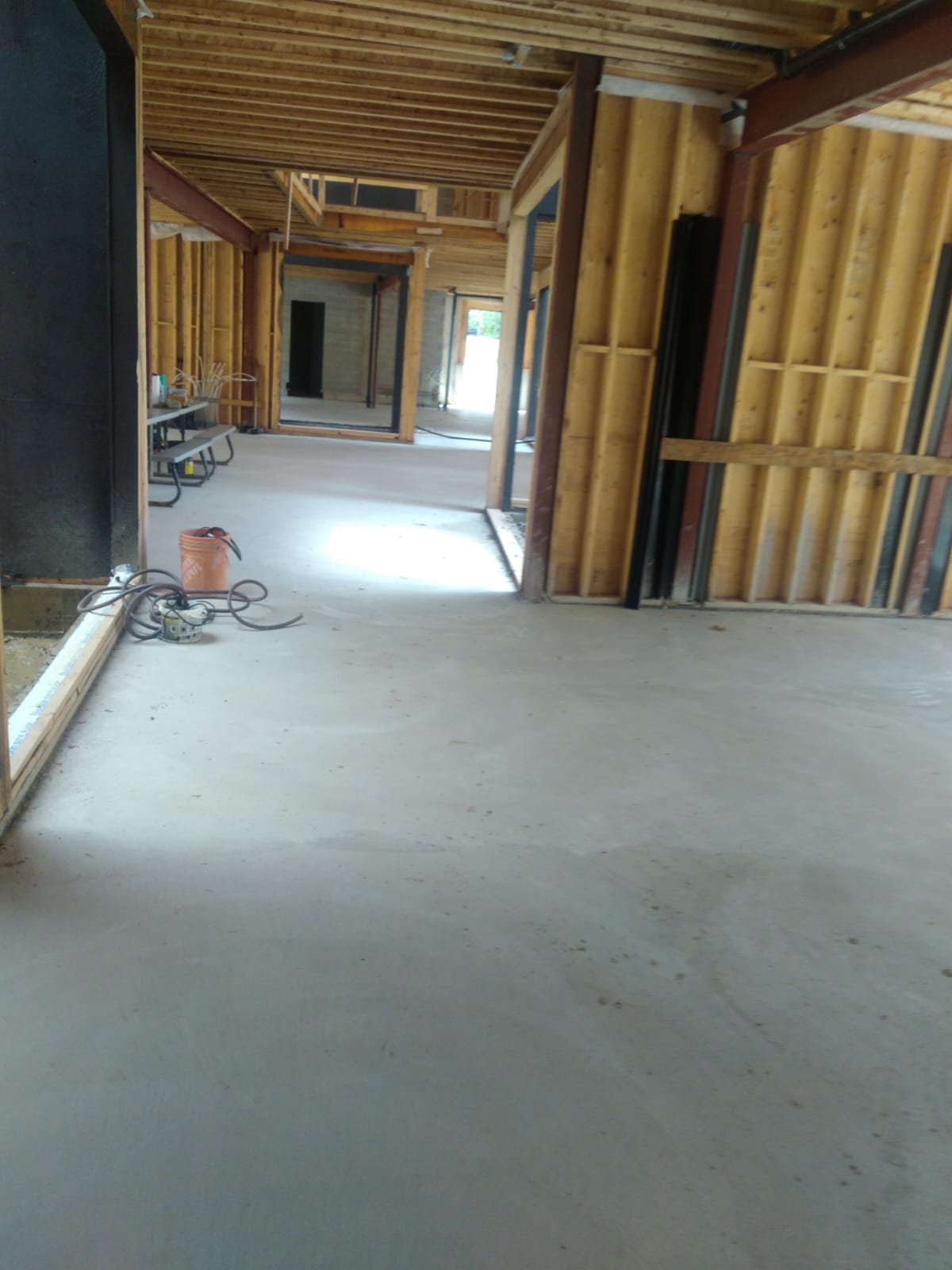 Interior corridor framing in progress during residential construction