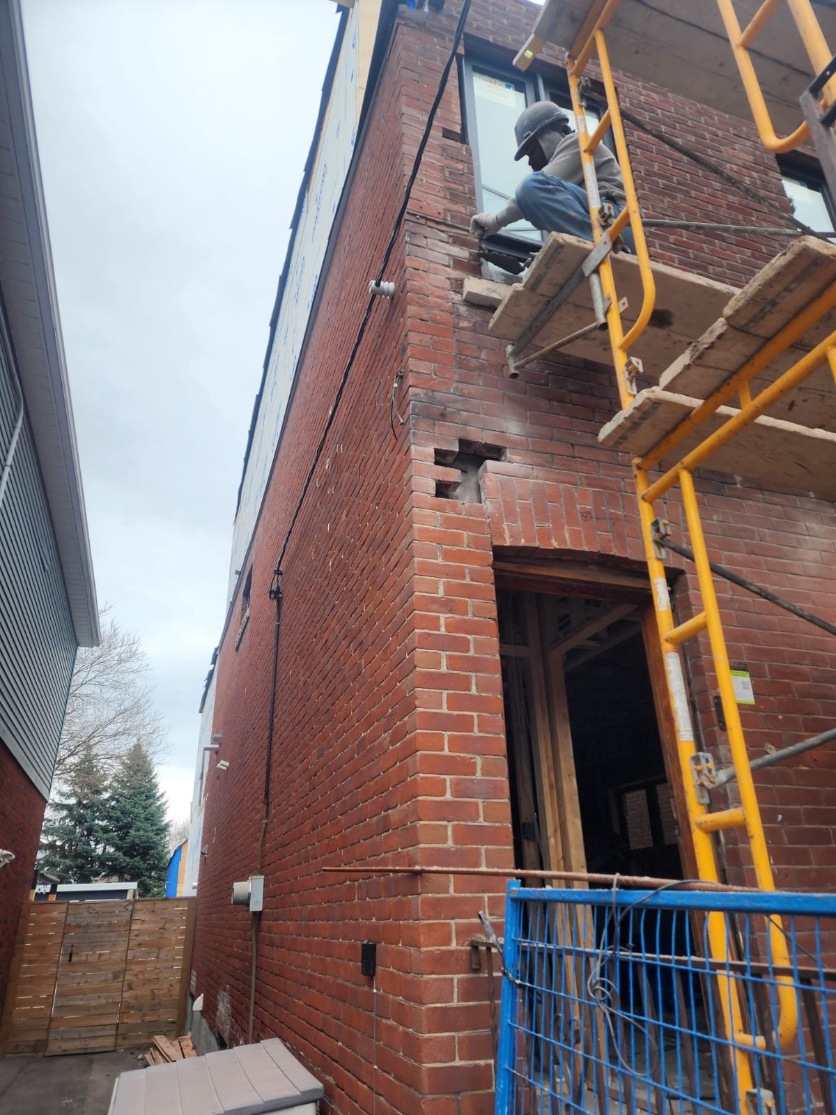 Brickwork in progress on a residential addition project