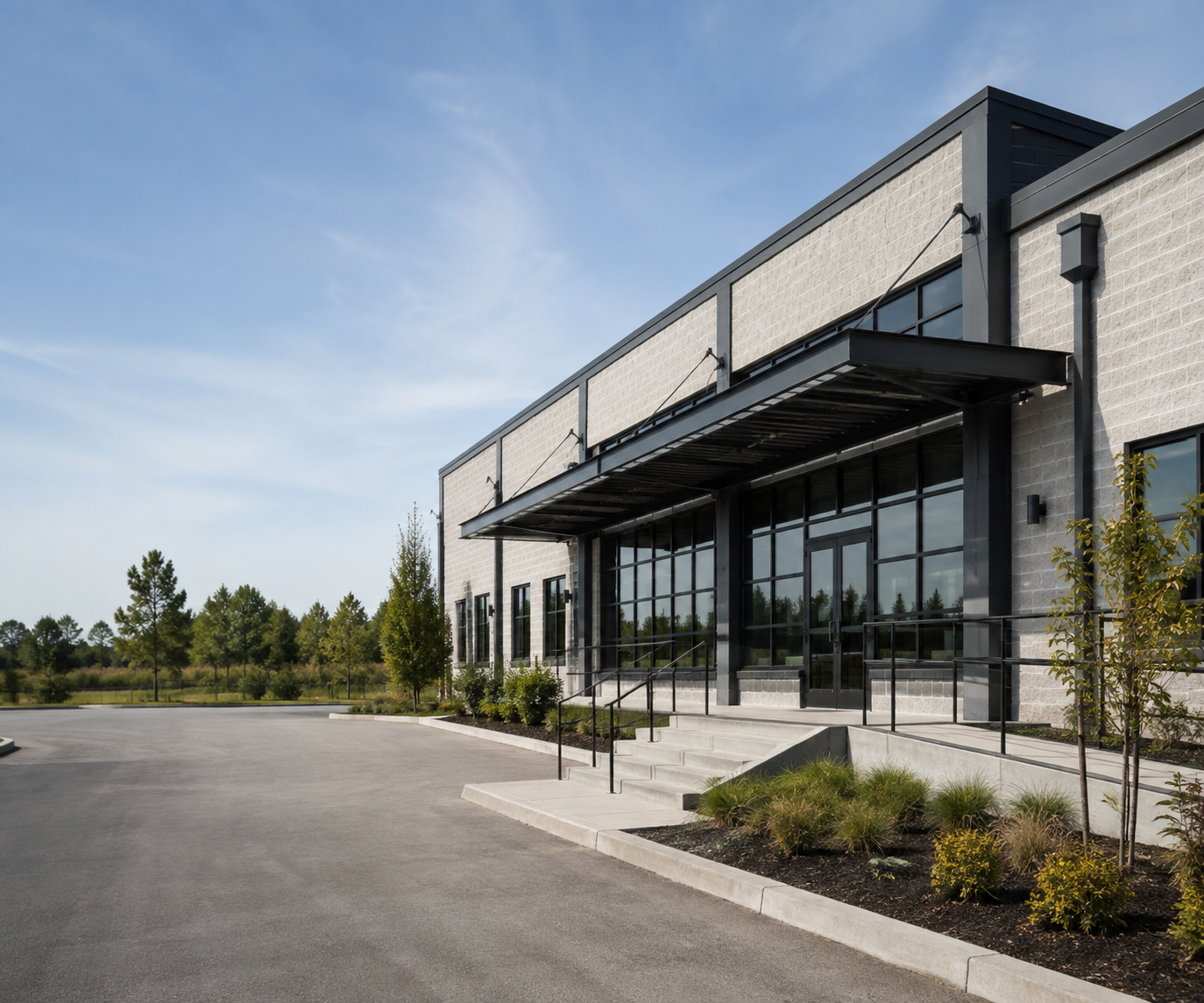 Completed commercial building with modern masonry and steel detailing